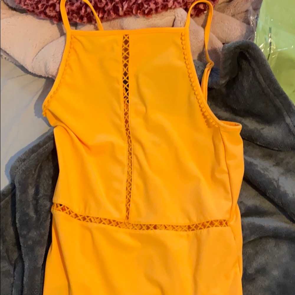 Divided body suit